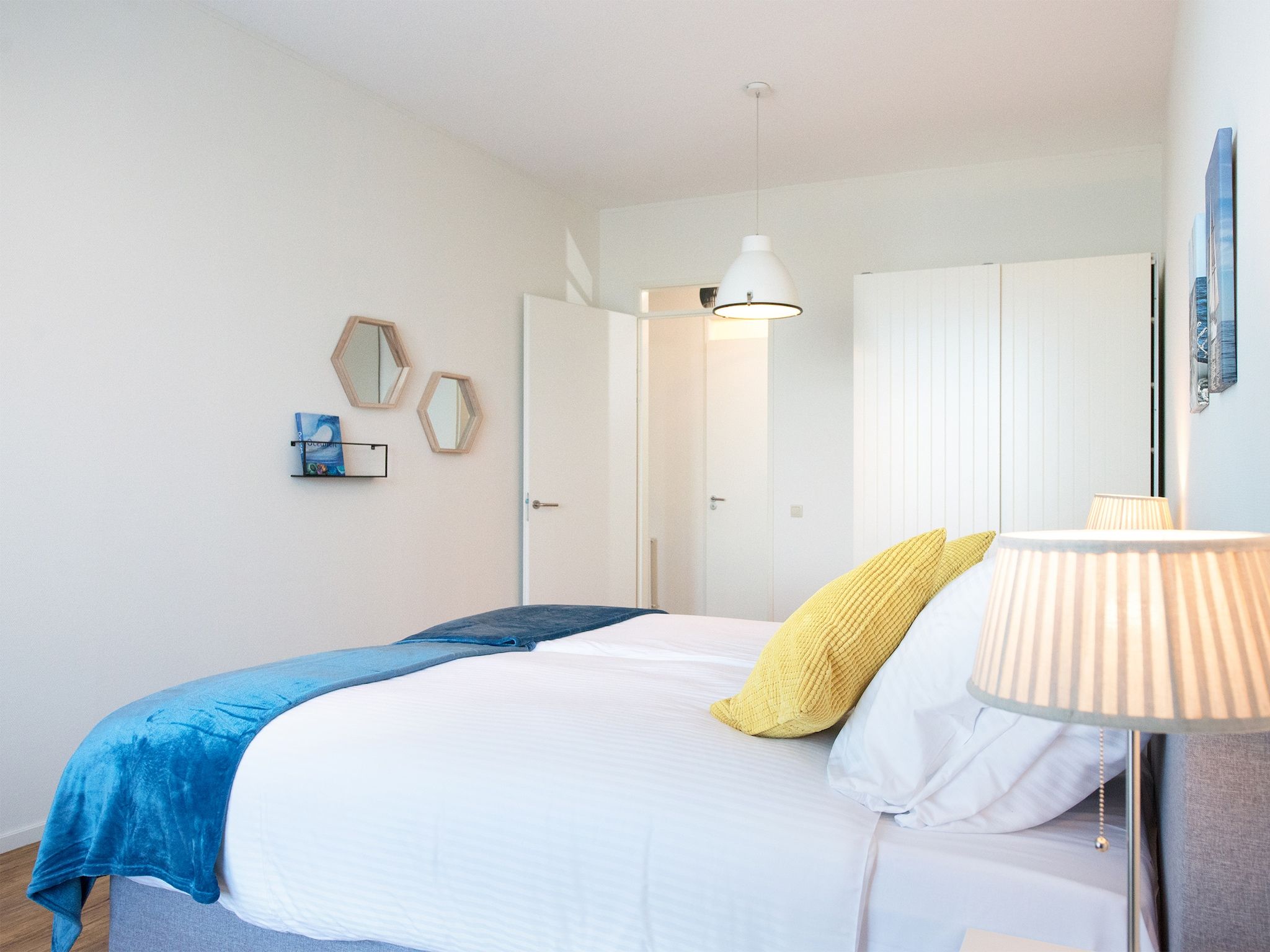 Een slaapkamer van Scheveningen Harbour 56D in Den Haag