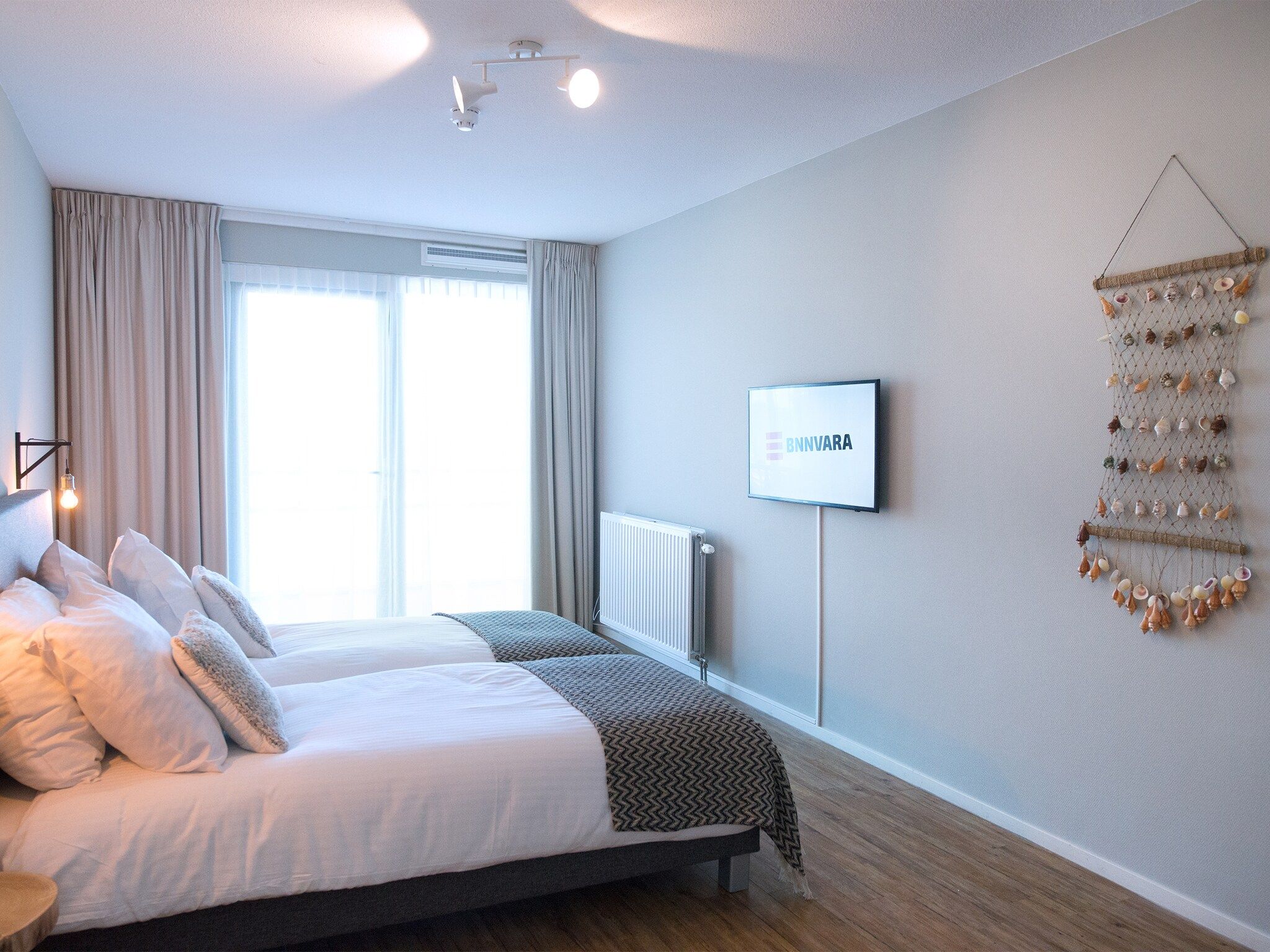 Een slaapkamer van Scheveningen Harbour 58 in Den Haag