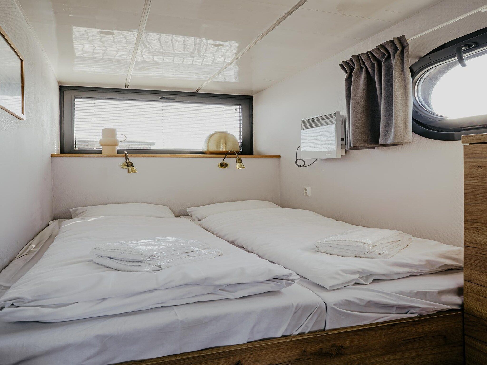 Een slaapkamer van Waterpark de Meerparel 10 in Uitgeest