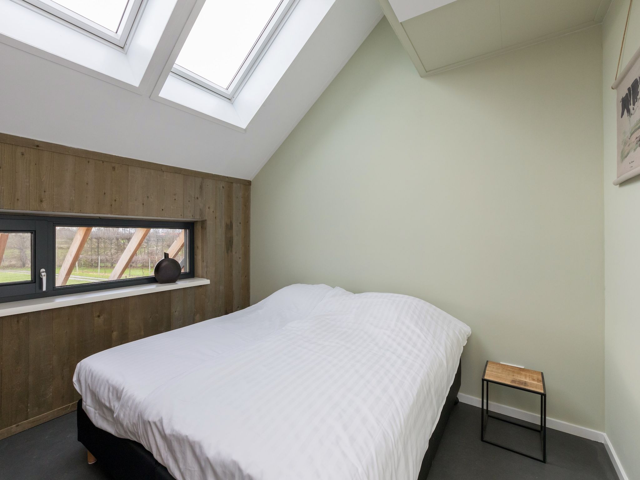 Een slaapkamer van Vroondijk 2-Zeebloesempje in Vrouwenpolder