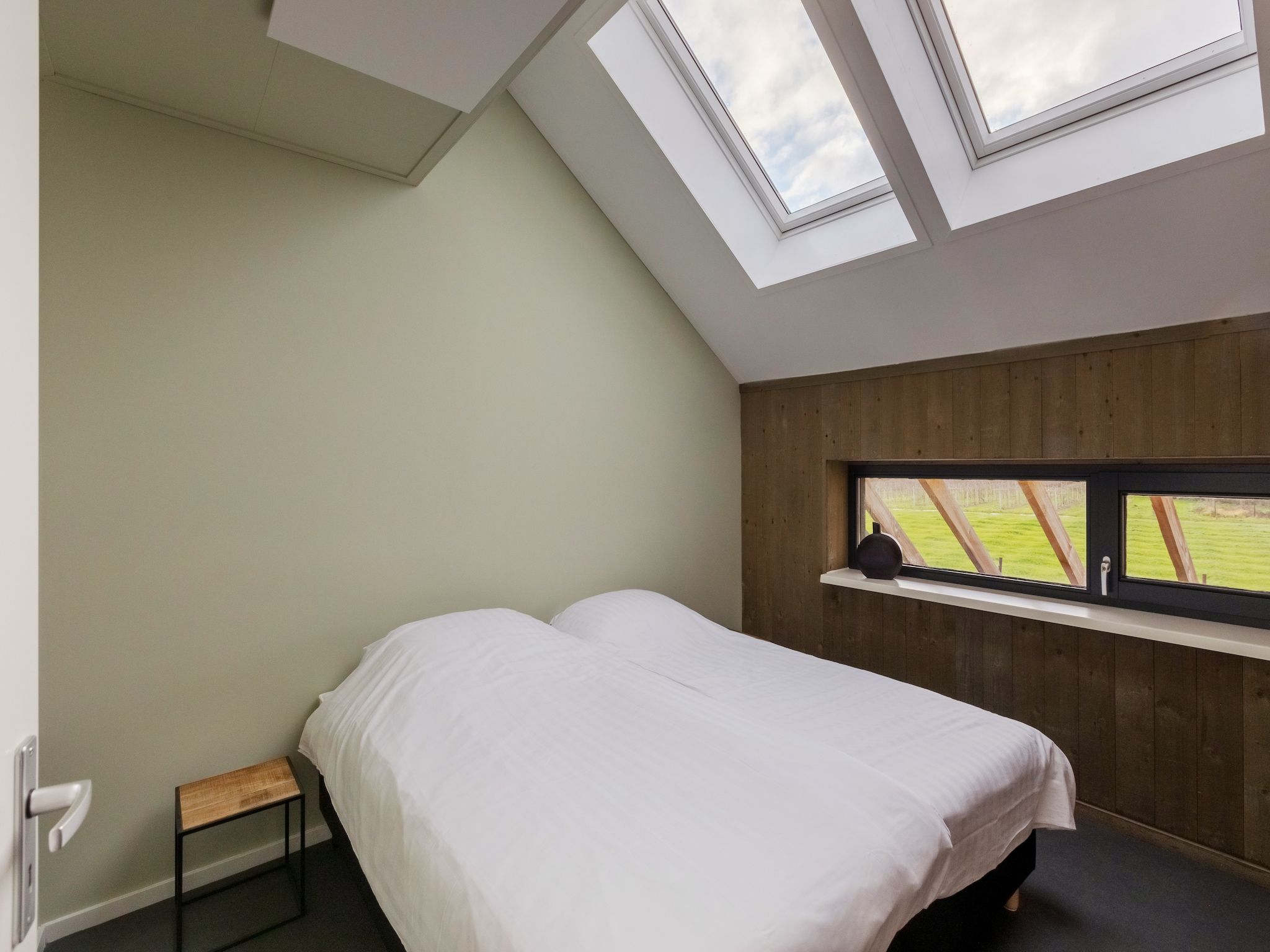 Een slaapkamer van Vroondijk 2-Zeebloesempje in Vrouwenpolder