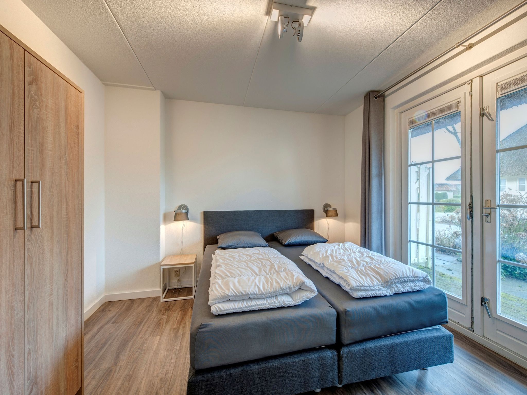Een slaapkamer van Buitenhof Domburg  14 in Domburg
