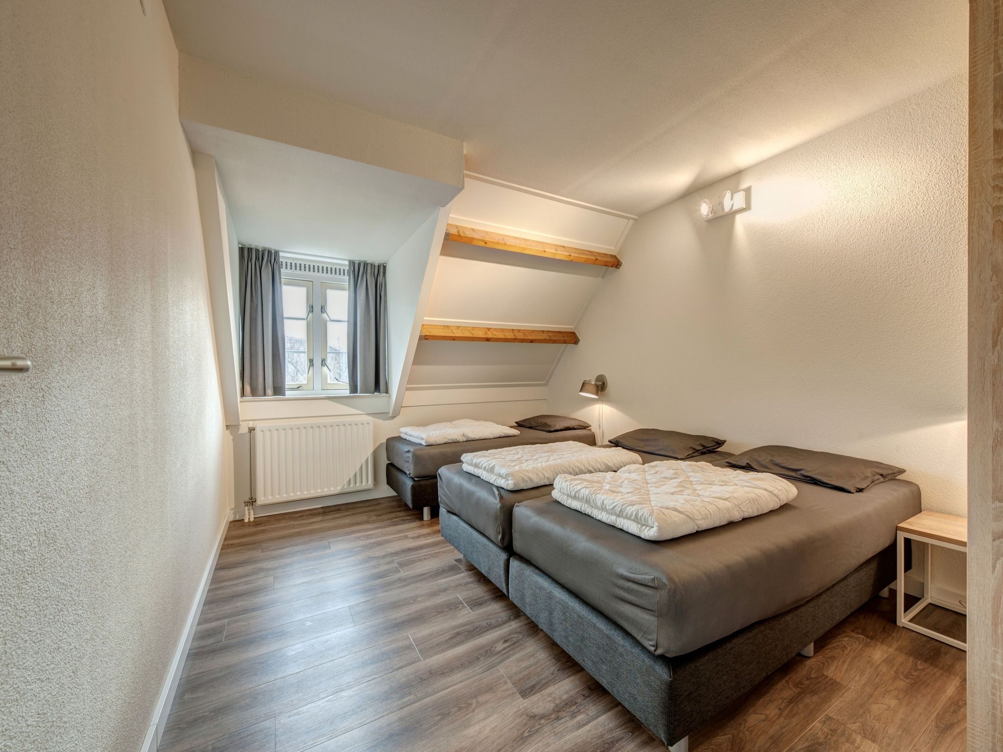Een slaapkamer van Buitenhof Domburg  15 in Domburg