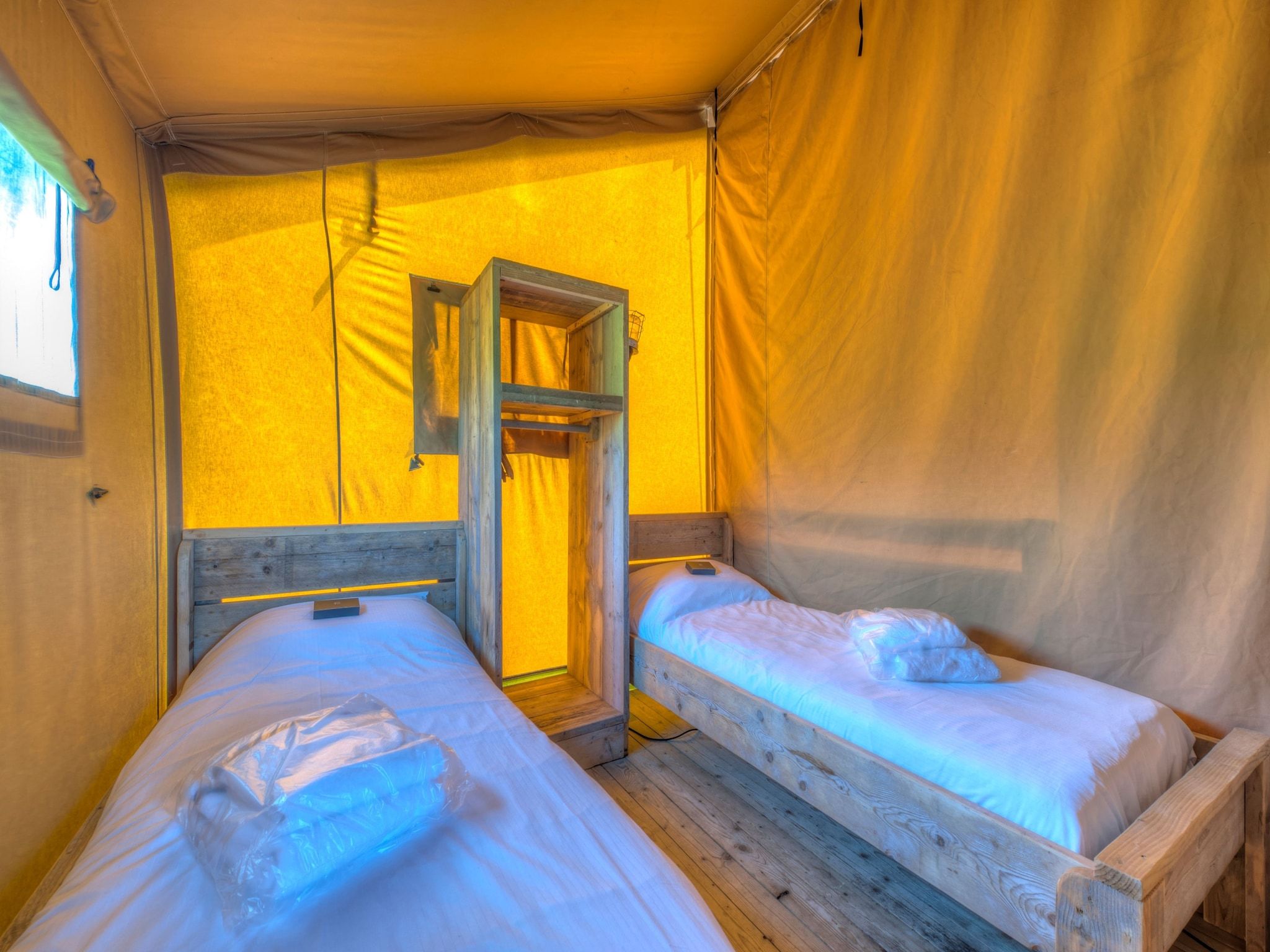 Een slaapkamer van Vakantiepark Hunzedal 15 in Borger