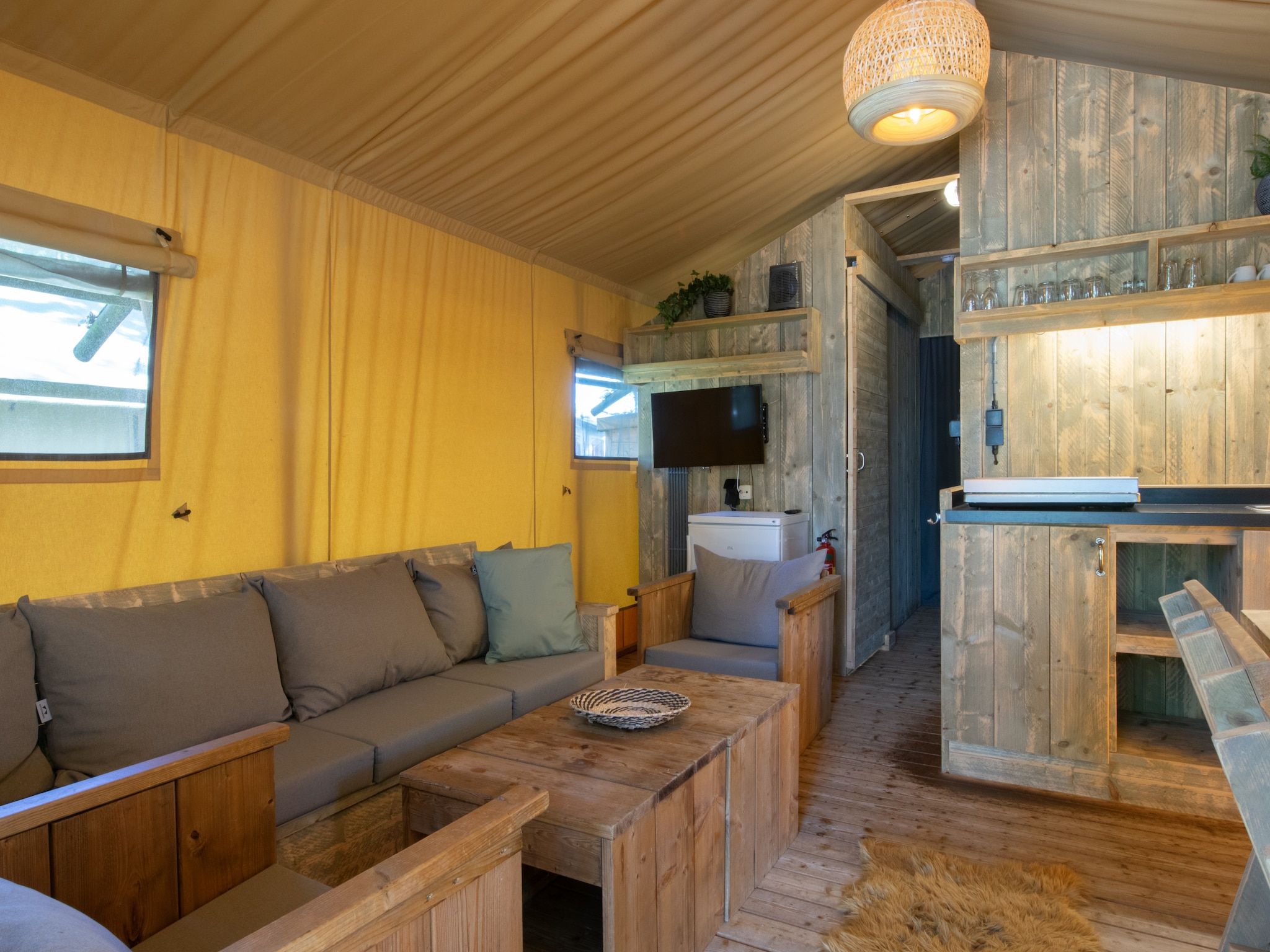 De woonkamer van Vakantiepark Klein Vink 20 in Arcen