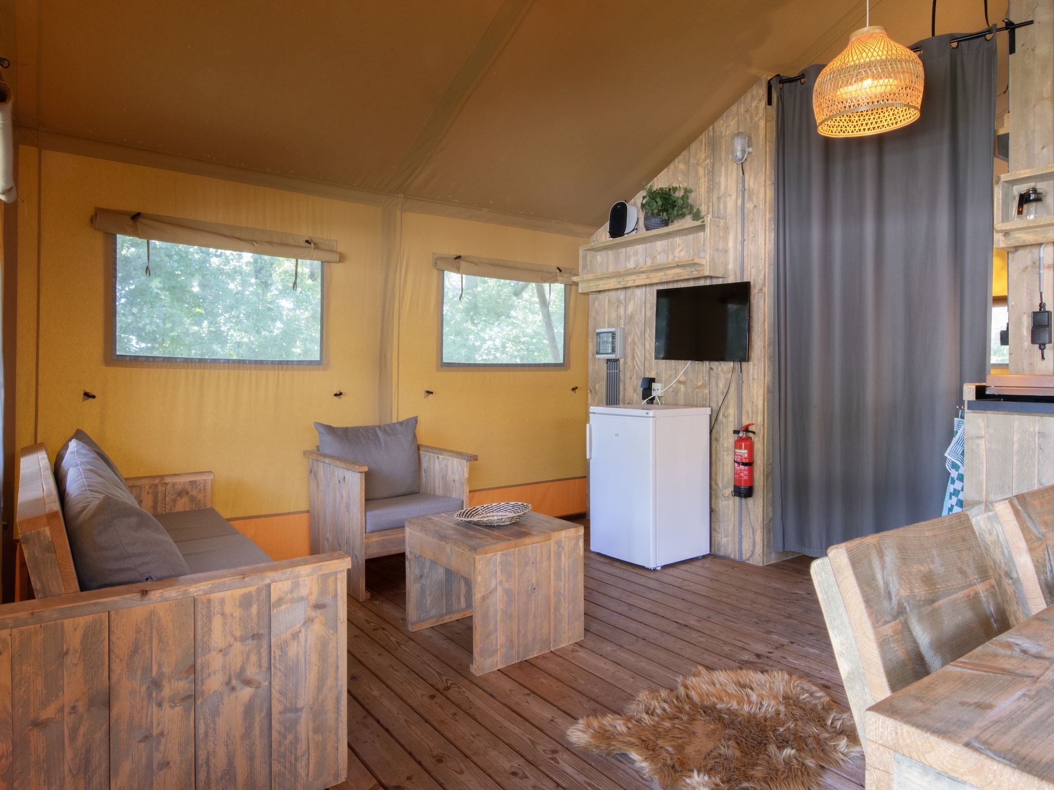De woonkamer van Vakantiepark Klein Vink 21 in Arcen