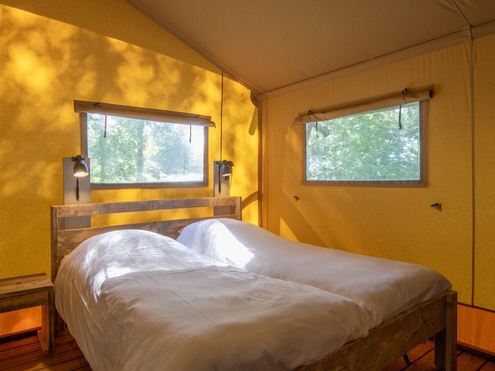 Een slaapkamer van Vakantiepark Klein Vink 21 in Arcen