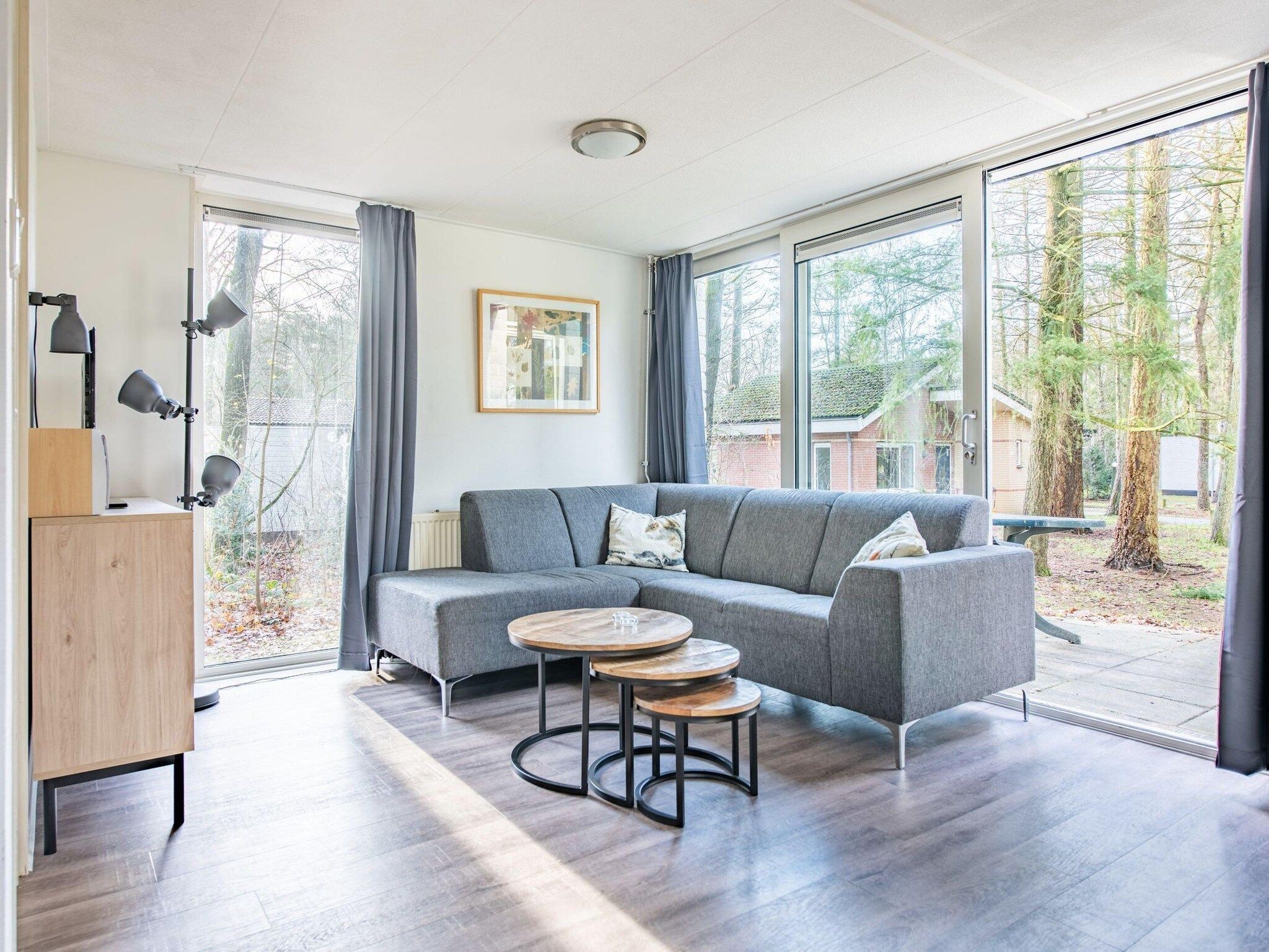 De woonkamer van Vakantiepark de Berkenhorst 11 in Kootwijk