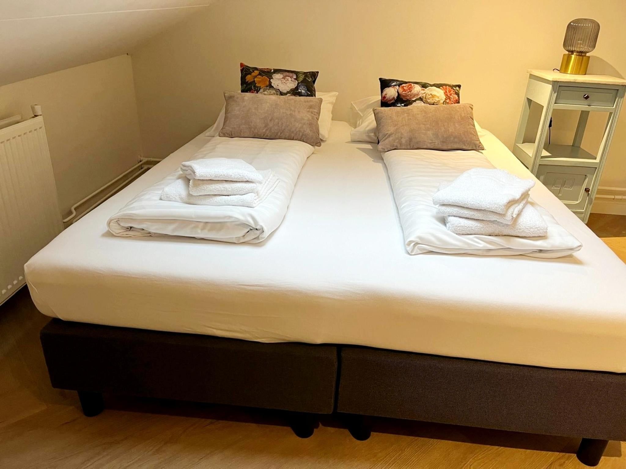 Een slaapkamer van Valleyview Cottages - NR13 in Voerendaal