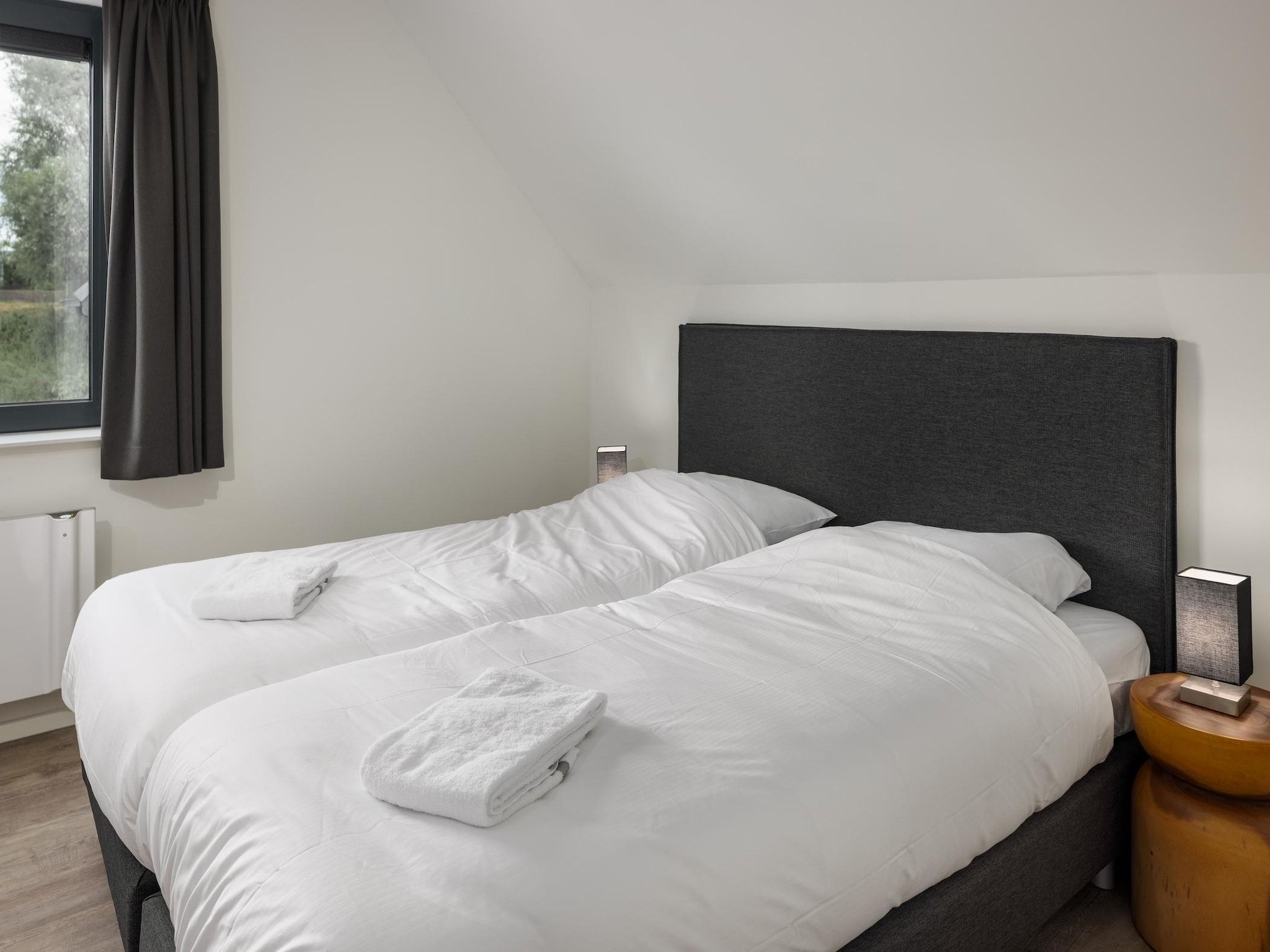 Een slaapkamer van Park Veerse Kreek 4 in Wolphaartsdijk