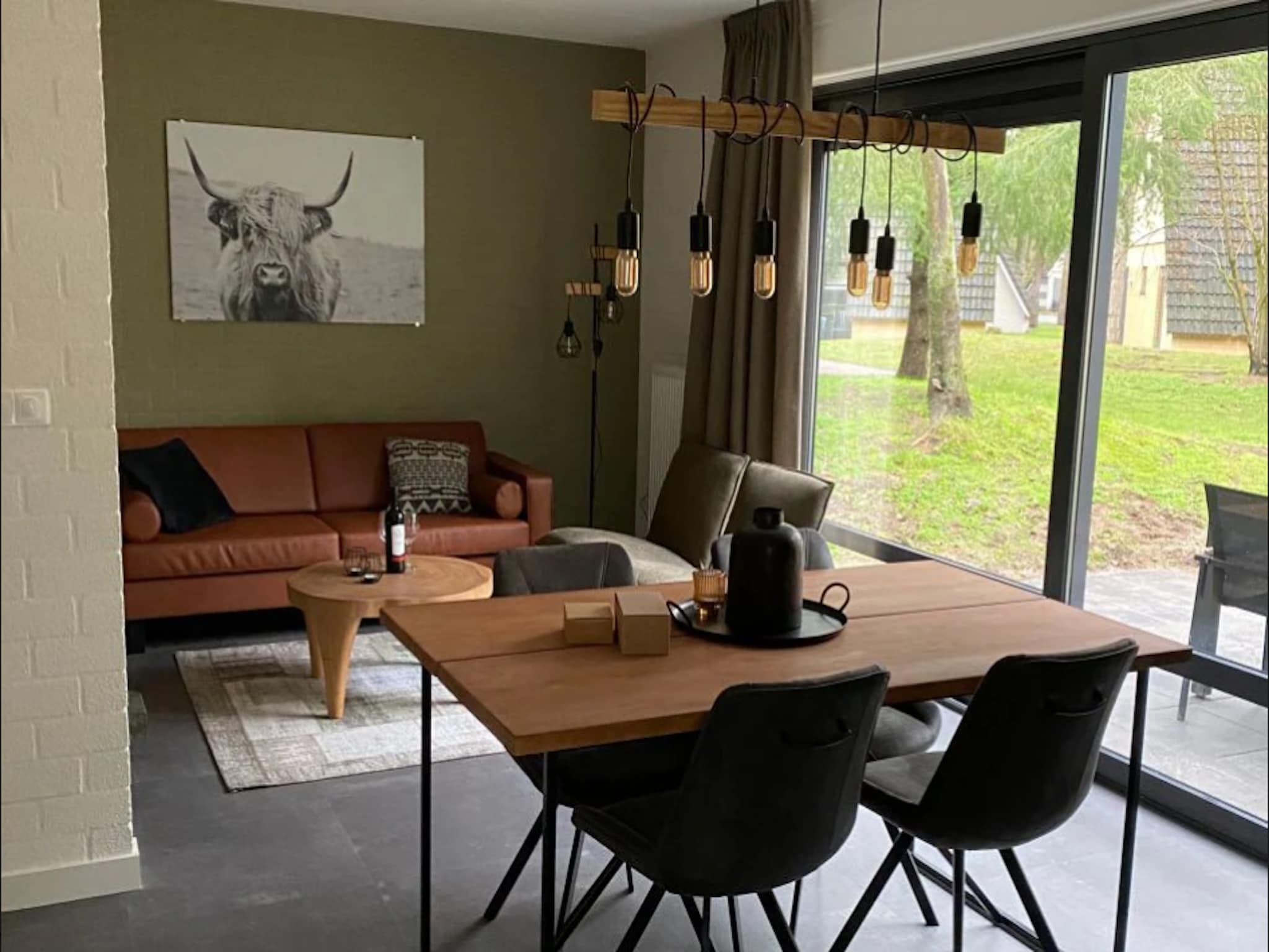 De woonkamer van Vakantiepark de Katjeskelder 20 in Oosterhout