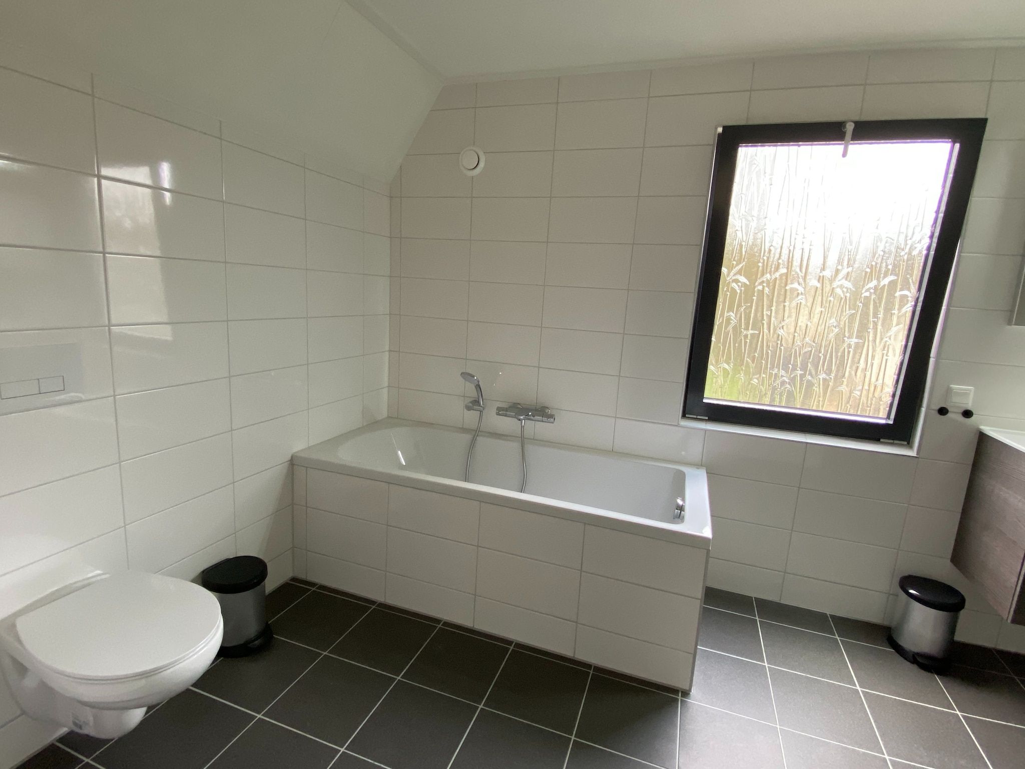 De badkamer van Vakantiepark de Katjeskelder 20 in Oosterhout