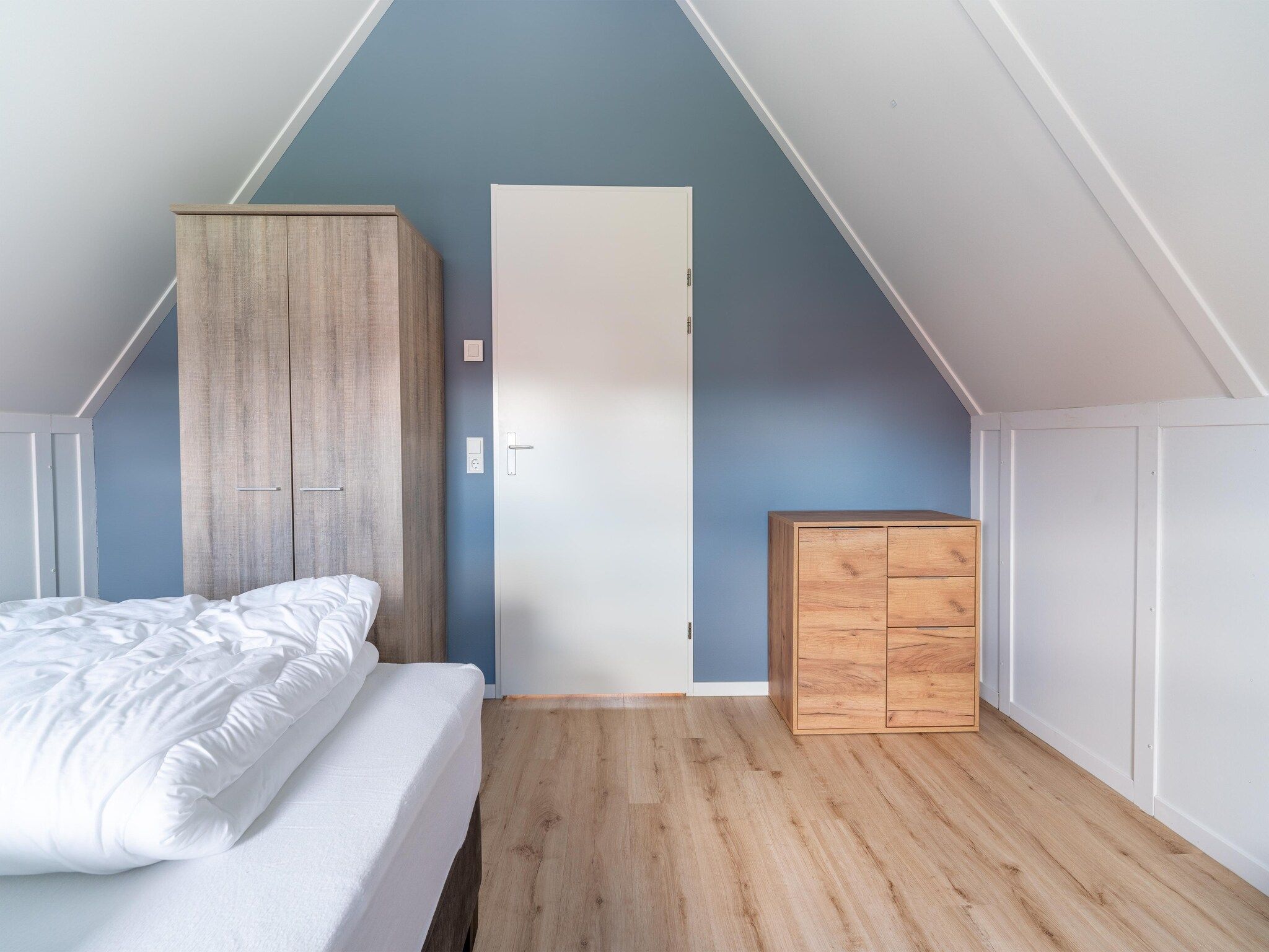 Een slaapkamer van De Kievit Huis Nr 36 in Scherpenisse