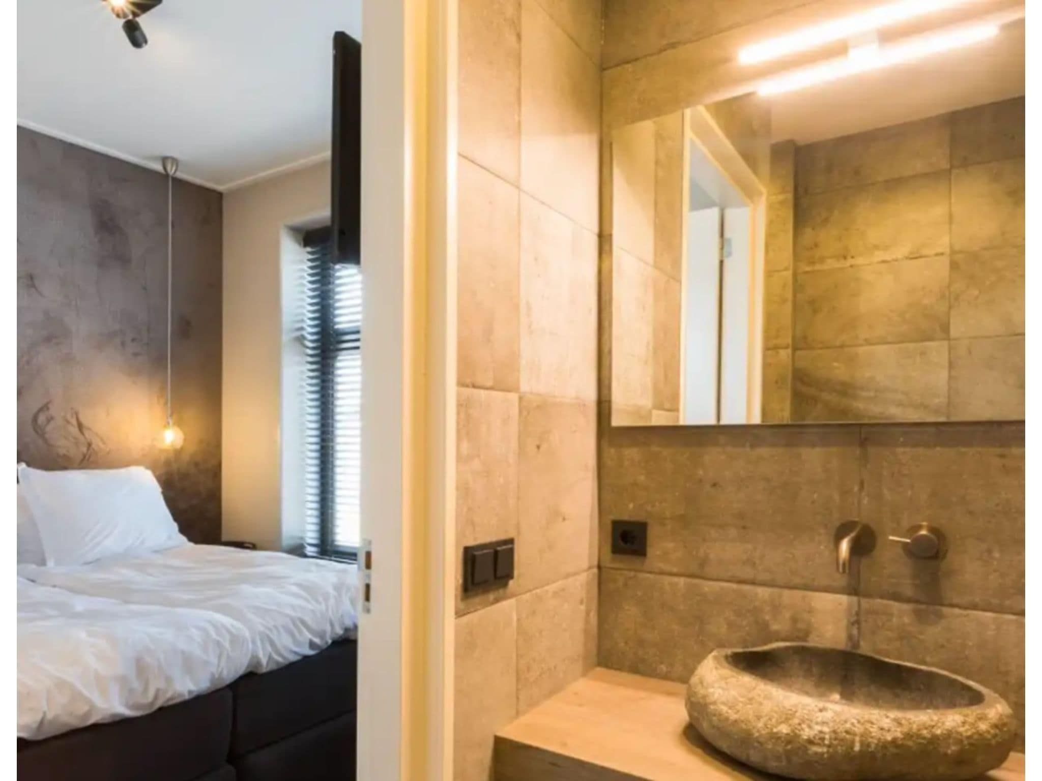 Een slaapkamer van Ooststraat 8a in Domburg