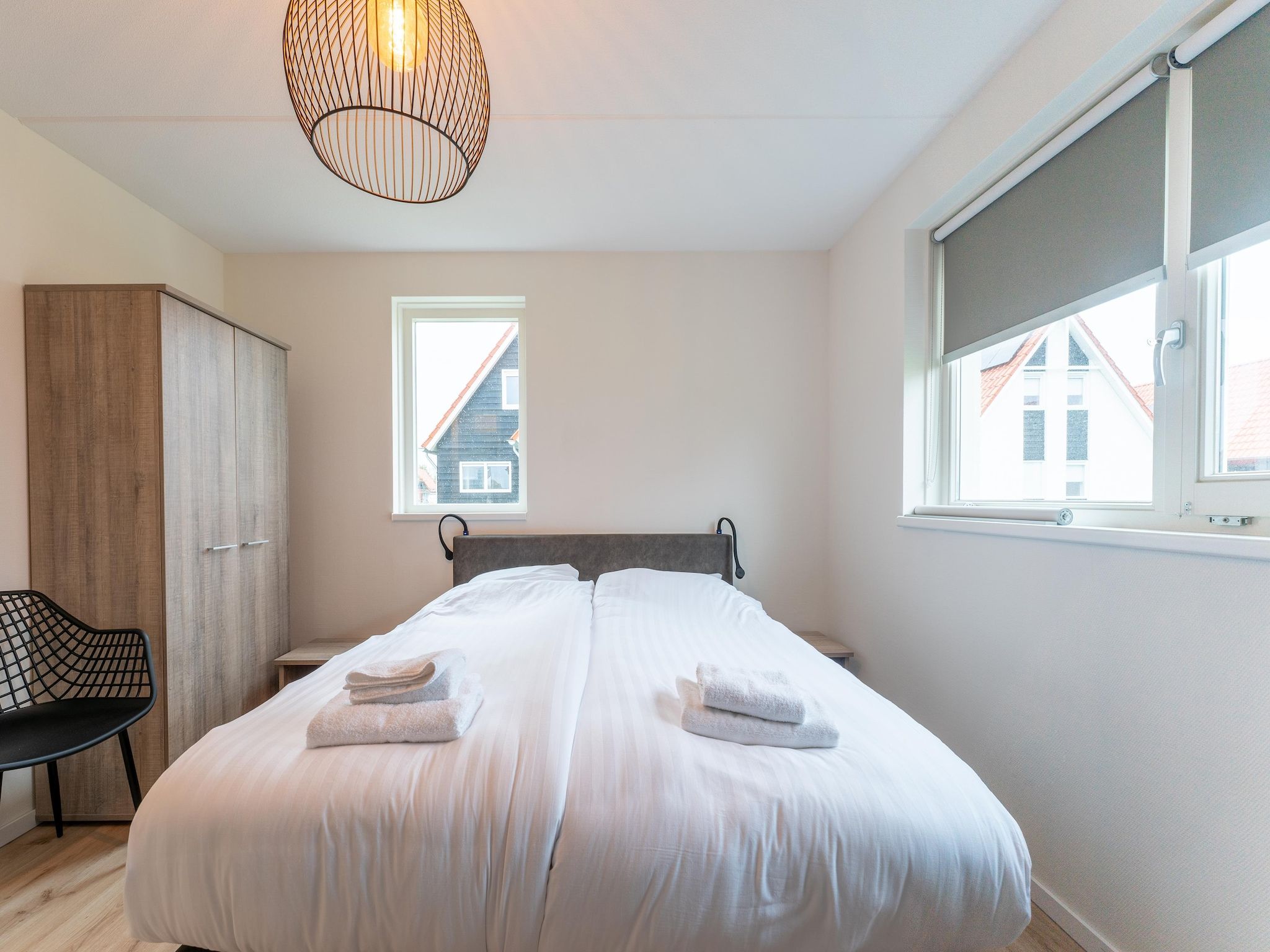 Een slaapkamer van De Wulp Huis Nr 50 in Scherpenisse