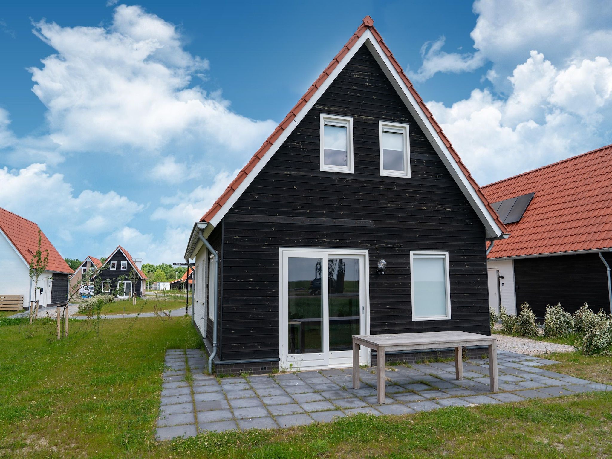 Het terras van Wulpdal Huis Nr 51 in Scherpenisse