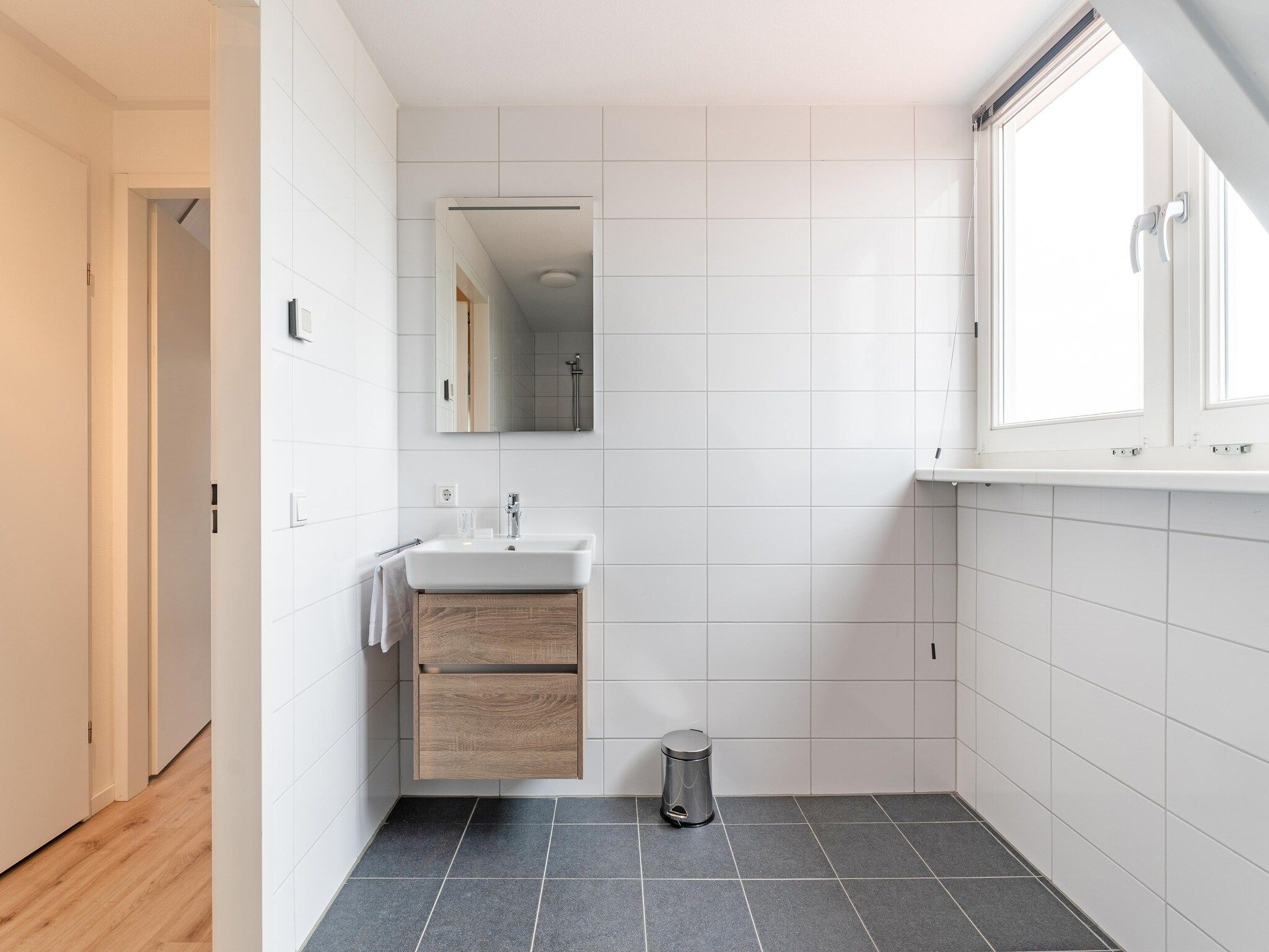 De badkamer van De Ooievaar Huis Nr 47 in Scherpenisse
