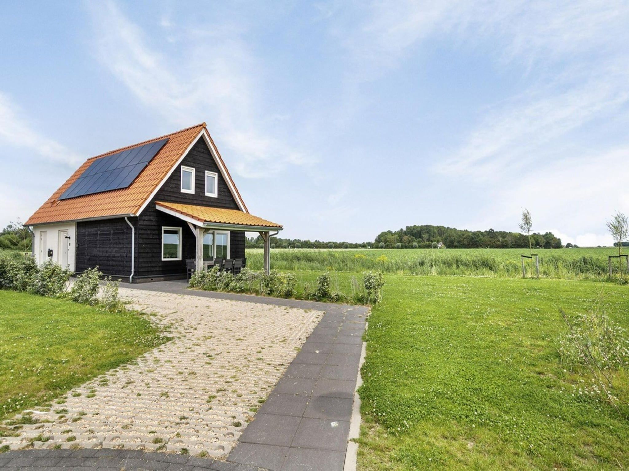 De buitenkant van De Ooievaar Huis Nr 47 in Scherpenisse