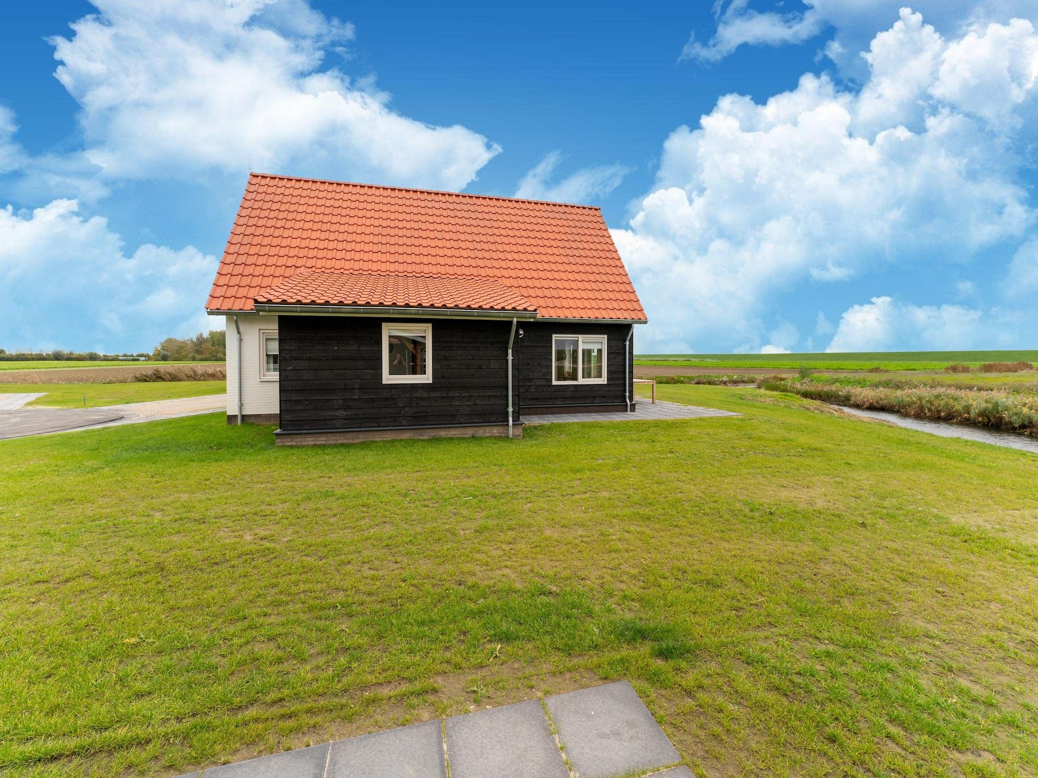 De tuin van De Albatros Huis Nr 49 in Scherpenisse