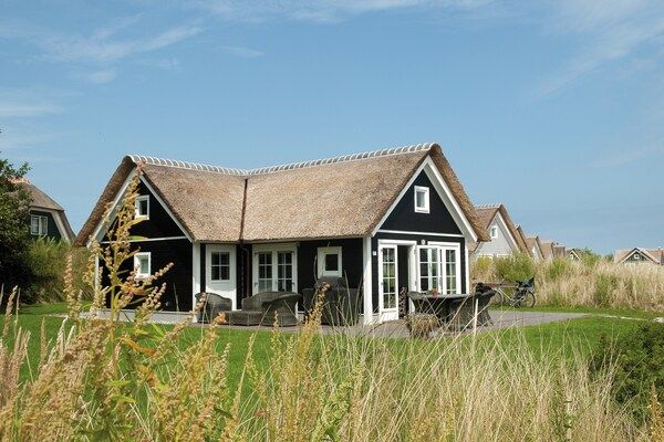 Buitenkant - Gezellige villa nabij zee en duinen in Hollum (5)