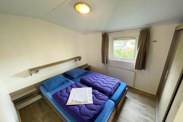 Slaapkamer - Appartement in Nederland met uitzicht in Elst (4)