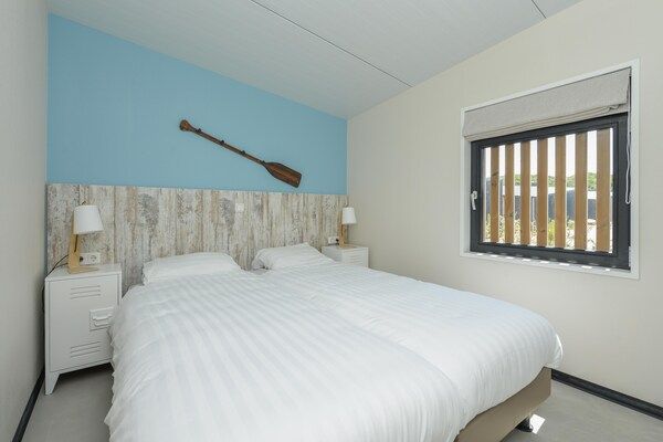 Slaapkamer - Comfortabele lodge In Bloemendaal aan zee in Bloemendaal (4)