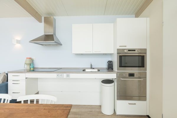 Keuken - Comfortabele lodge vlakbij het strand in Hollum (3)