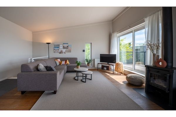 Woonkamer - Watervilla Kortgene aan Veerse Meer in Kortgene (1)