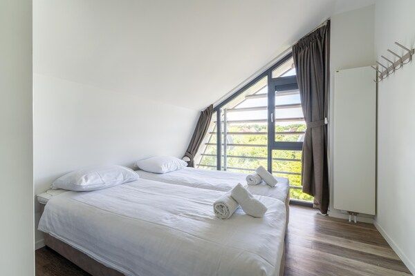 Slaapkamer - Villa in Egmond bij Strand & Molen in Egmond aan den Hoef (5)