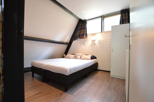 Slaapkamer - Huisdiervriendelijke vakantie in Stramproy (1)