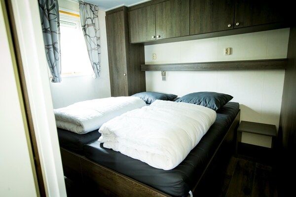 Slaapkamer - Chalet bij Loonse en Drunense Duinen in Udenhout (3)