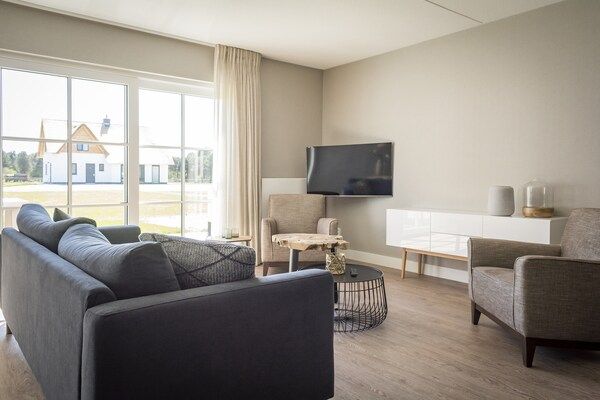 Woonkamer - Appartment in sfeervolle boerderij in de Cocksdorp in De Cocksdorp Texel (4)