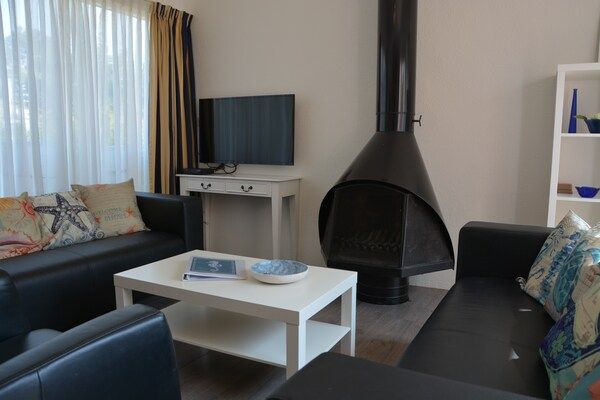 Woonkamer - Vakantiehuis bij Meer en Strand Noordwijk in Noordwijkerhout (2)
