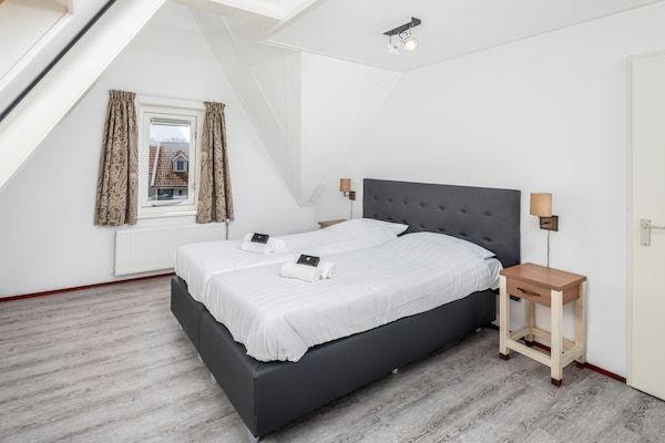 Slaapkamer - Vakantiehuis in Aquadelta met Tuin in Bruinisse (4)