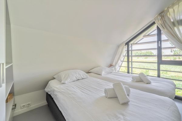 Slaapkamer - Prachtig vakantiehuis vlakbij de zee in Egmond aan den Hoef (4)