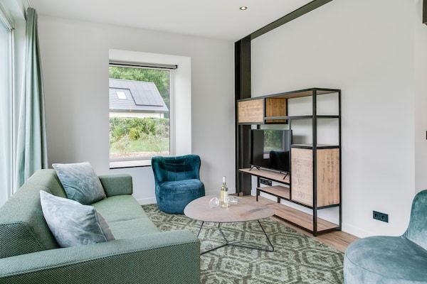 Woonkamer - Bungalow op Texel bij Nationaal Park Duinen in De Koog Texel (4)