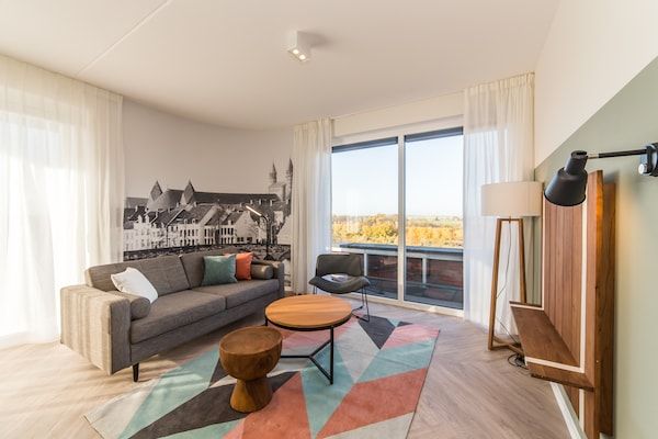 Woonkamer - Ruime suite op slechts 4km van Maastricht in Maastricht (1)