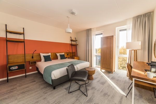 Slaapkamer - Stijlvol appartement in luxe hotel in Maastricht (1)