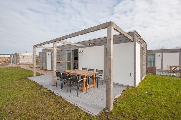 Buitenkant - Lodge in Nieuwvliet Bad bij het Strand in Nieuwvliet-Bad (1)