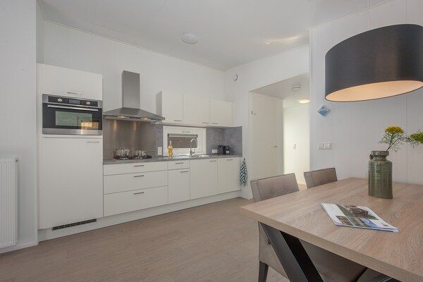 Keuken - Lodge in Bospark met Sauna & Tuin in Mierlo (3)