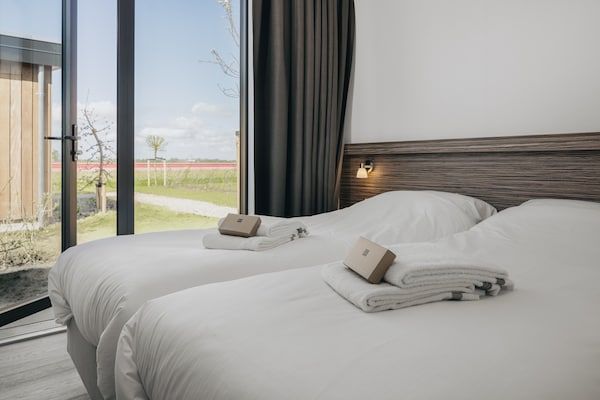 Slaapkamer - Lodge aan Markermeer met groen ontwerp in Wijdenes (4)