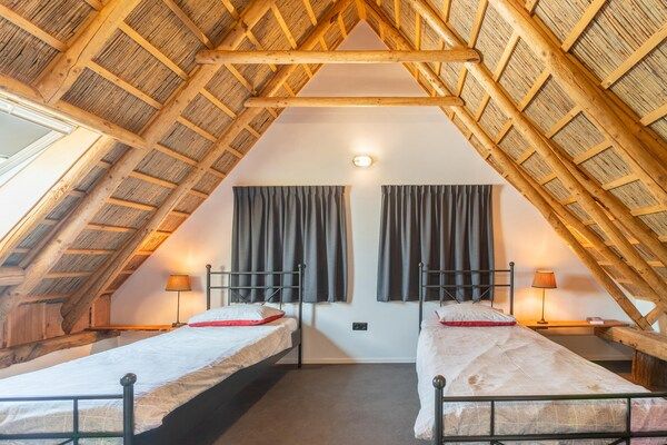 Slaapkamer - Boerderij in Staphorst met sauna in Rouveen (3)