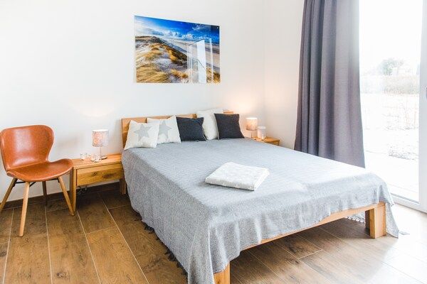 Slaapkamer - Villa aan Veerse Meer met Uitzicht in Kamperland (3)