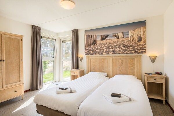 Slaapkamer - Gezellig kustverblijf Texel in De Koog (4)
