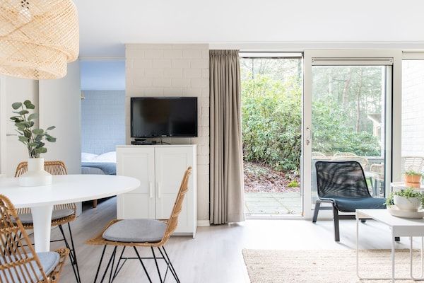 Woonkamer - Bungalow bij Veluwezand in Kootwijk (2)