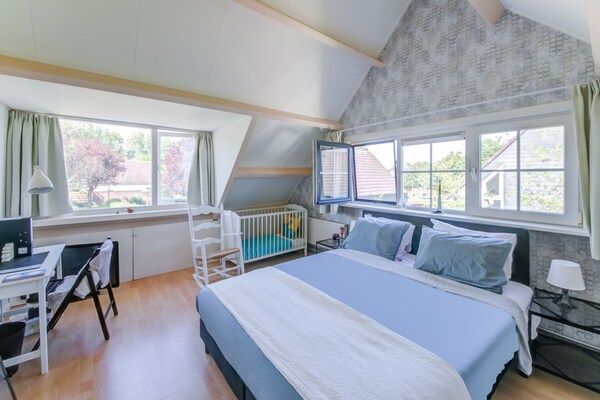 Slaapkamer - Comfortabel vakantiehuis vlakbij de zee in Noordwijkerhout (2)
