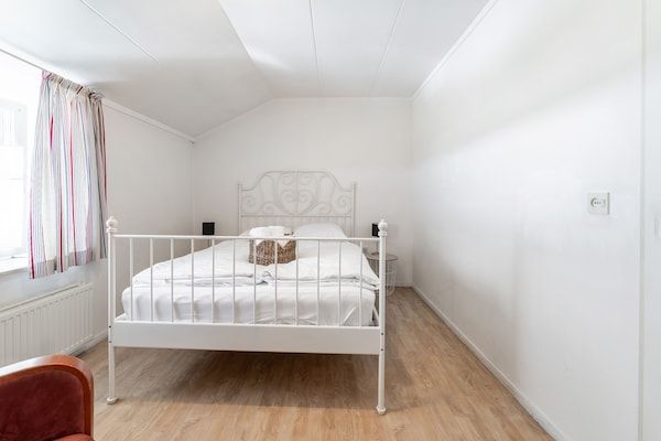 Slaapkamer - Gezellig appartement in Voerendaal met tuin in Voerendaal (4)