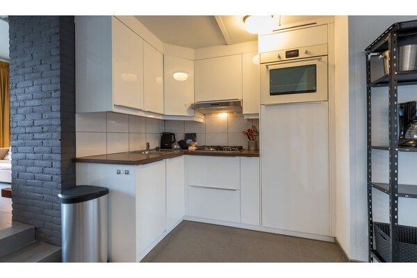 Keuken - Comfortabel vakantiehuis vlakbij het strand in Nieuwvlietbad (4)