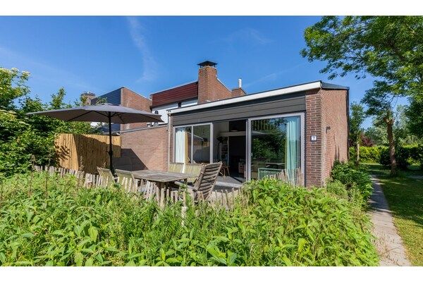 Buitenkant - Comfortabel vakantiehuis vlakbij het strand in Nieuwvlietbad (1)