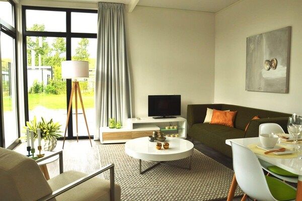 Woonkamer - Moderne vakantiewoning in Nieuwvliet in Nieuwvliet (4)